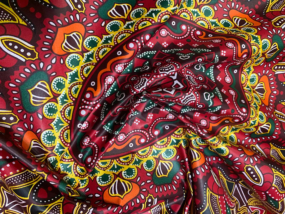 What are the unique features of Polyester African Wax Fabric compared with traditional African batik fabric?